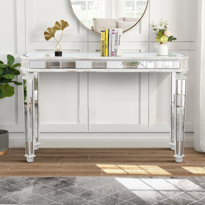 Ophelia & Co. Mirror Console Table with Vintage Wood Carving Combining Modern Elegance and Classic Craftsmanship for a Timeless Look
