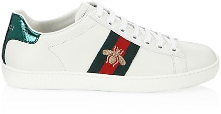 white gucci shoes with snake