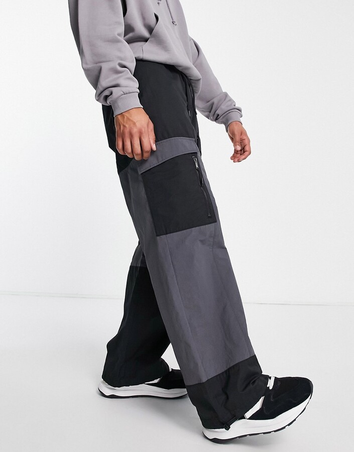 Topman extreme baggy cut and sew cargo pants in black - ShopStyle