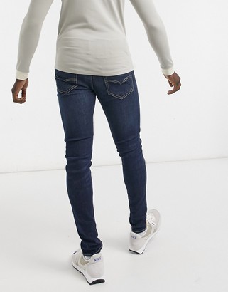 Levi's skinny taper fit jeans in brimstone advanced dark wash - ShopStyle