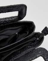 Thumbnail for your product : PrettyLittleThing top handle bag in black faux snake