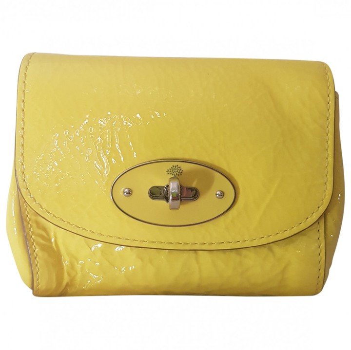 yellow patent clutch bag