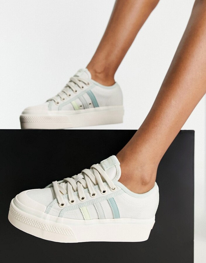 adidas Nizza Platform sneakers in cream white and lime - ShopStyle