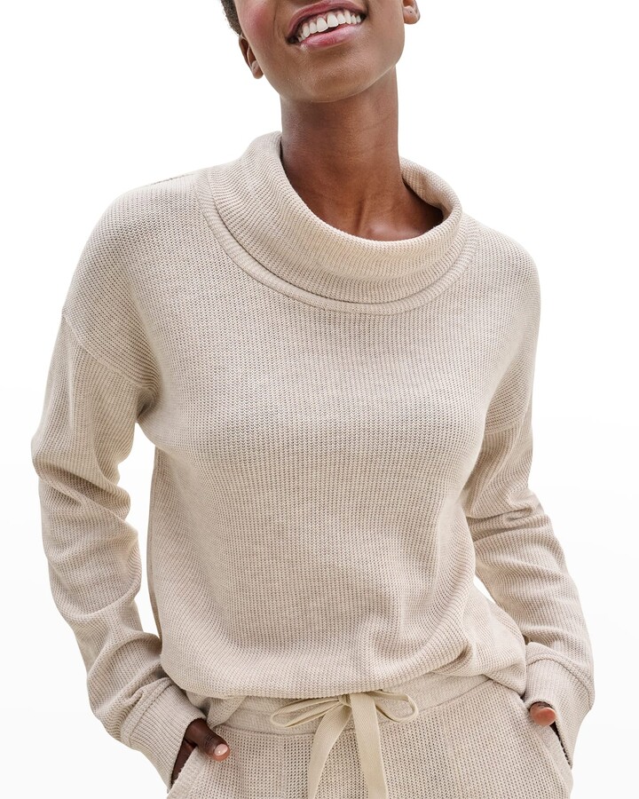 beige funnel neck sweater
