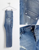 Thumbnail for your product : ASOS DESIGN drop crotch jeans in mid wash blue with cargo pockets and rips