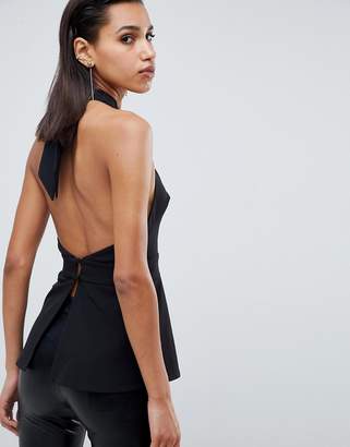 ASOS DESIGN wrap front peplum top with cut out