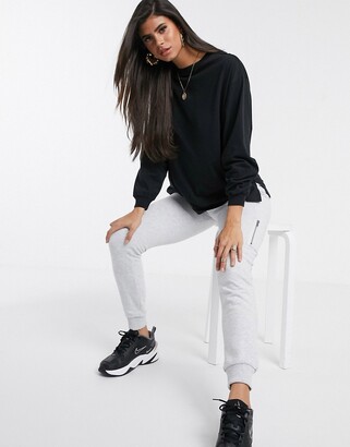 ASOS DESIGN DESIGN oversized long sleeve t-shirt with cuff detail in black