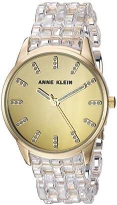 Anne Klein Women's AK/2616CLGB Glitter Accented Gold-Tone and Clear Transparent Resin Bracelet Watch