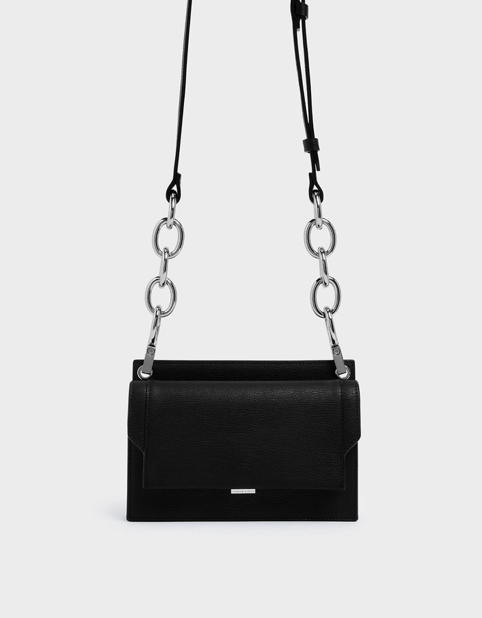 Charles & Keith Eyelet Embossed Push Lock Clutch ShopStyle
