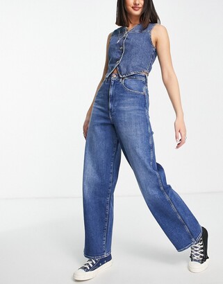 Wrangler high rise wide barrel jeans in mid wash blue - ShopStyle