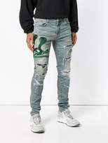 Thumbnail for your product : Amiri snake patch distressed jeans