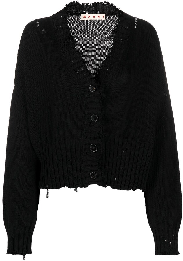 frayed black sweater