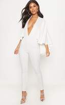 Thumbnail for your product : PrettyLittleThing White Plunge Cape Jumpsuit