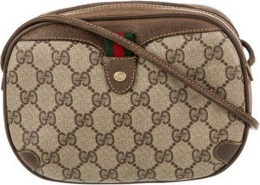 Gucci Crossbody Bag Vintage Neutrals GG Supreme Web Accent & Interlocking G Logo Gold-Tone Hardware Leather Trim Single Shoulder Strap Leather Trim Embellishment Suede Lining Zip Closure at Top
