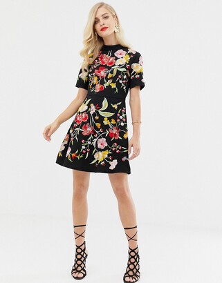 ASOS DESIGN embroidered mini dress with high neck and open back