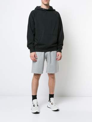 Reigning Champ midweight terry track shorts