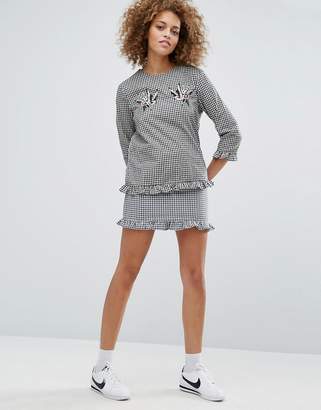 Style Nanda STYLENANDA Gingham Mini Skirt With Ruffle Hem