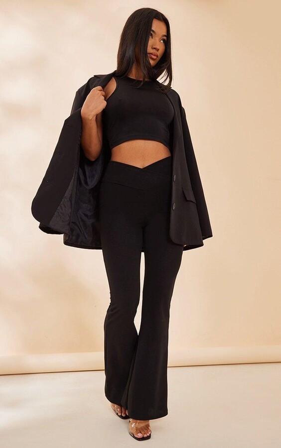 Black Crepe Dip Cross Over Hem Flare Trousers ShopStyle