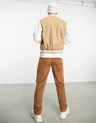 ASOS DESIGN oversized varsity bomber jacket with embroidery in tan