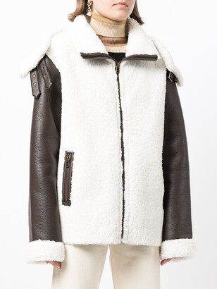 Unreal Fur Symbiosis faux-shearling and leather jacket