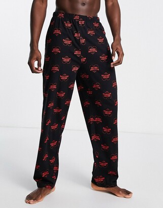 ASOS DESIGN lounge bottoms in black with heart print - ShopStyle Pajamas