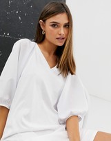 Thumbnail for your product : ASOS DESIGN v neck mini dress with woven puff sleeves in white