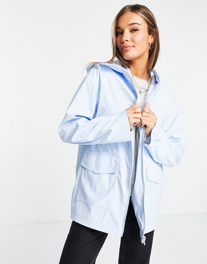 ASOS DESIGN rubberised raincoat with contrast stitch detail in blue -  ShopStyle