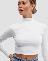 Thumbnail for your product : ASOS DESIGN turtle neck long sleeve rib crop top in white
