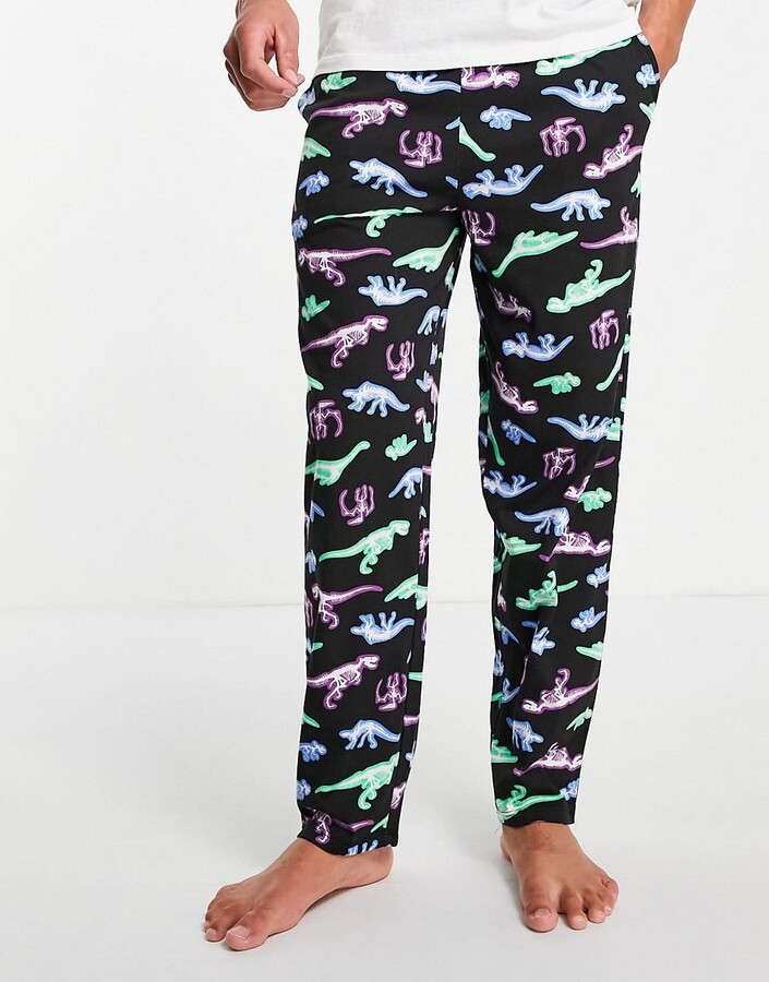 Verdeelstuk Ademen Hertogin ASOS DESIGN lounge pajama bottoms with dinosaur print in black - ShopStyle