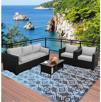 https://img.shopstyle-cdn.com/sim/e4/3c/e43c3041d1e4cd3d62a51bfa0af3a443_xlarge/union-rustic-recycled-patio-outdoor-plastic-straw-rug-clearance-waterproof-rv-camper-rug-large-reversible-mats-9x18-grey.jpg