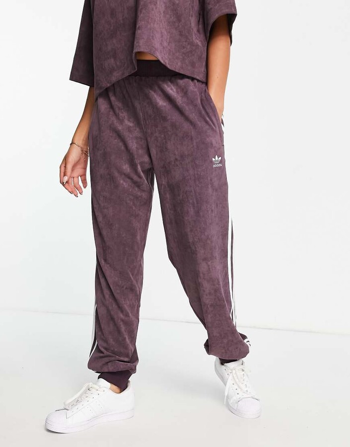 adidas faux suede joggers in maroon ShopStyle Activewear Trousers