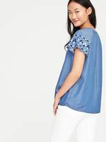 Thumbnail for your product : Old Navy Relaxed Lace-Up Neck Chambray Top for Women