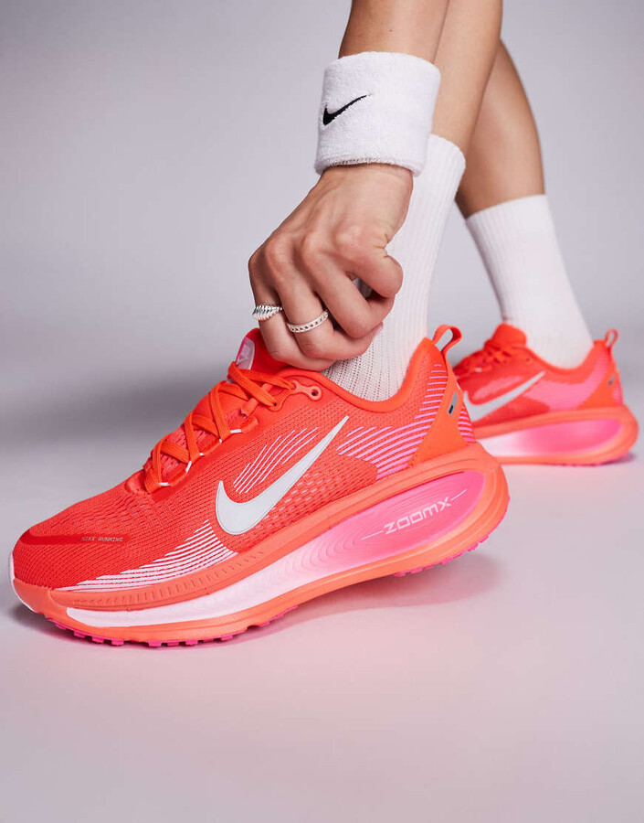 Nike Running Nike Vomero 18 running sneakers in pink