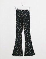 Thumbnail for your product : Topshop Petite flare trousers in ditsy floral print
