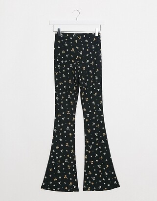 Topshop Petite flare trousers in ditsy floral print