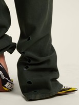 Thumbnail for your product : Vetements Hem Hole Track Pants - Dark Green