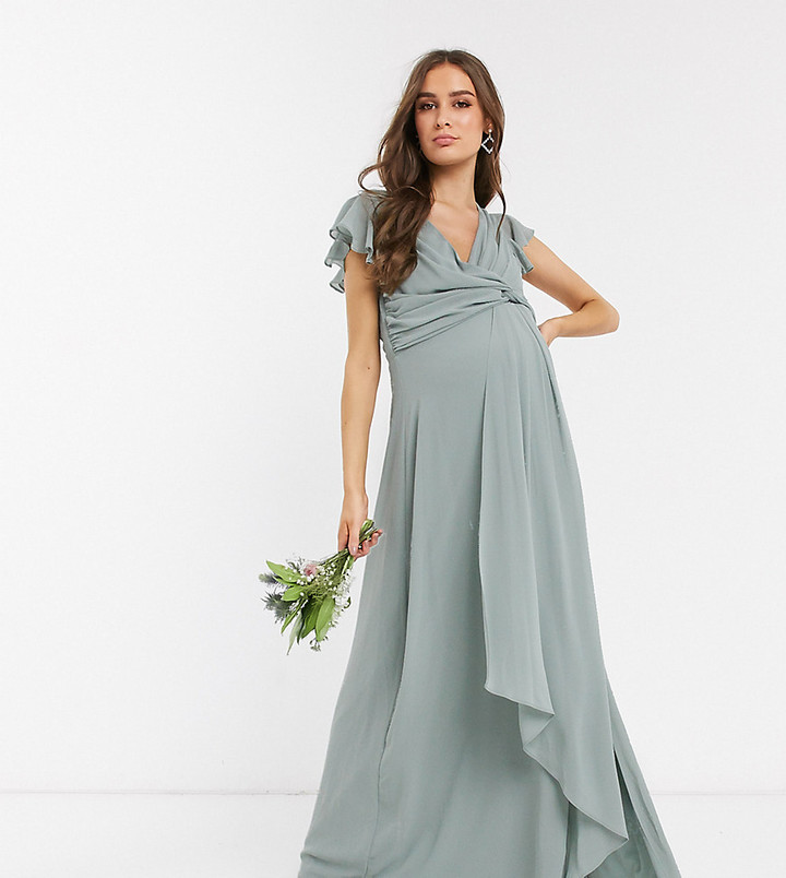 TFNC Maternity bridesmaid flutter sleeve ruffle detail maxi dress in ...