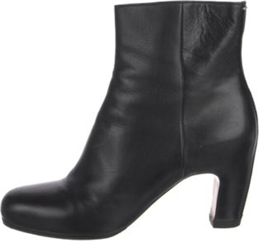 Maison Margiela Leather Ankle Boots Black Round-Toes Platform Exposed Zip Closure at Sides Unfortunately, due to restrictions, this item may not be eligible for shipping in all areas.