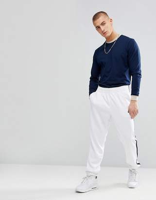 ASOS DESIGN Relaxed Long Sleeve T-Shirt With Contrast Ringer And Contrast Cuff In Blue