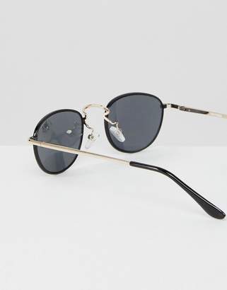 ASOS Design 90S Small Oval Sunglasses In Black With Silver Metal Nose Bridge