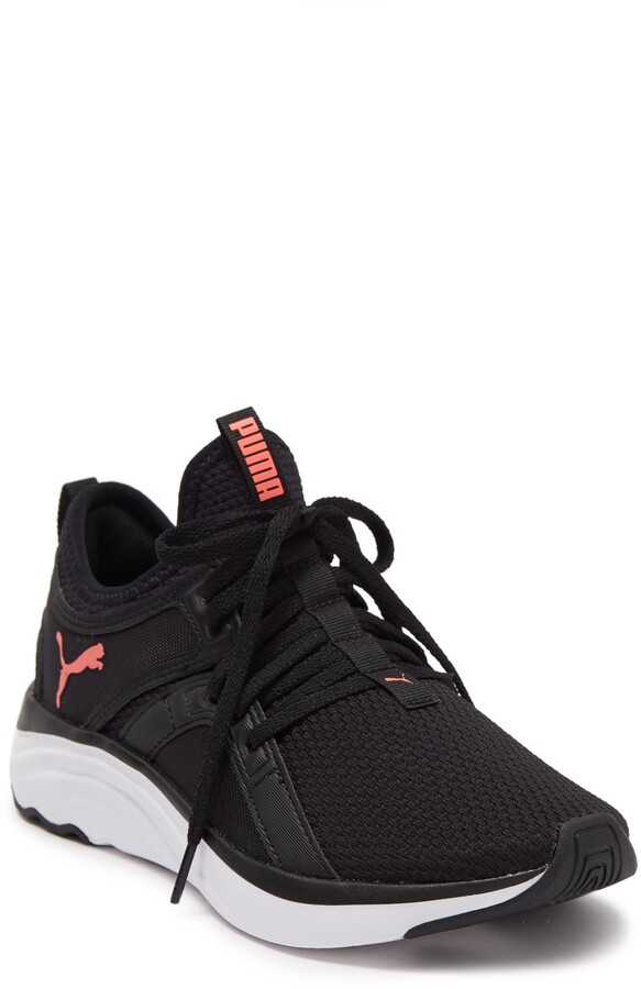black and pink pumas