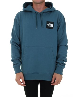 blue north face sweater