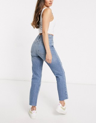 ASOS DESIGN Hourglass low rise stretch flare jeans with lace up in black