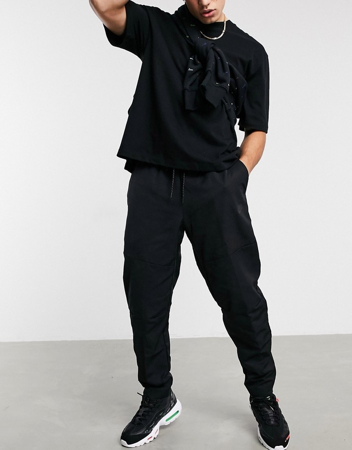 nike premium essentials winterized sweatpants in black