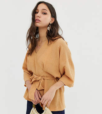 ASOS Tall DESIGN Tall textured oversized top with v neck and tie waist