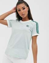 mint green adidas shirt womens