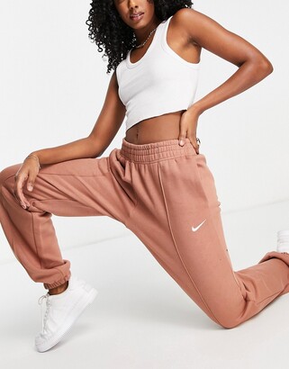 Nike Collection Fleece loose fit cuffed sweatpants in brown - BROWN -  ShopStyle Plus Size Pants