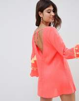 Thumbnail for your product : ASOS Design DESIGN fringed trim beach cover up with tassel trim