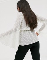 Thumbnail for your product : ASOS DESIGN long sleeve sheer top with lace up detail in metallic dobby