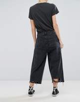 Thumbnail for your product : ASOS Petite Crop Cargo Jeans In Extreme Black Acid Wash With Pocket Chain